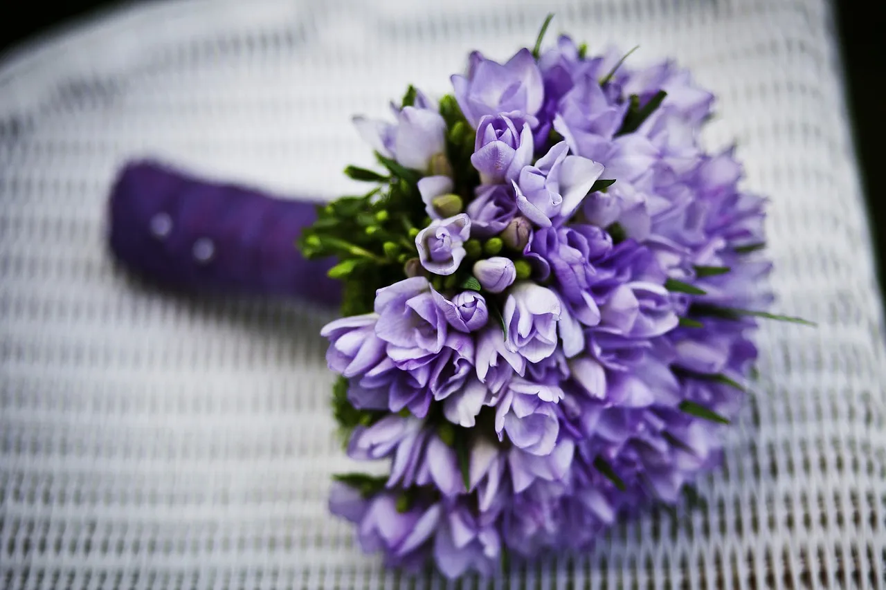 Close-up of a seasonal bridal bouquet with layered blooms